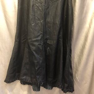 Black leather skirt by June with sexy pleating